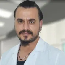Op. Dr. Toray Bektaş — Ortopedi Ve Travmatoloji, Çukurova, Adana. Portre fotoğrafı.