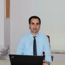 Dr. Öğr. Üyesi Kamil Gökçe Tulacı — Kulak Burun Boğaz, Balıkesir. Portre fotoğrafı.