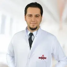 Dr. Öğr. Üyesi Sina Mokhtare — Genel Cerrahi, İstanbul. Portre fotoğrafı.