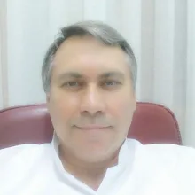 Uzm. Dr. Gürbüz Aydemir — Çocuk Sağlığı Ve Hastalıkları, Bursa. Portre fotoğrafı.