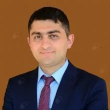 Doç. Dr. Şahin Hanalioğlu — Beyin Ve Sinir Cerrahisi, Ankara. Portre fotoğrafı.