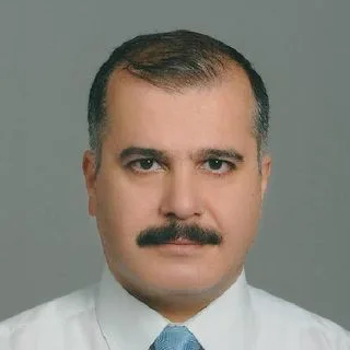 Dr. Turgay Öngel — Pratisyen. Portre fotoğrafı.