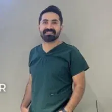 Uzm. Dt. Ayhan Doğan. Portre fotoğrafı.