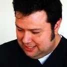 Dr. Dt. Mehmet Sarıoğlu — Ortodonti, İzmir. Portre fotoğrafı.