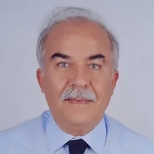 Prof. Dr. Mustafa Behçet Sevin — Kalp Ve Damar Cerrahisi, Eskişehir. Portre fotoğrafı.
