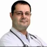 Dr. Volkanhan Çapar — Pratisyen, İstanbul. Portre fotoğrafı.