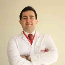 Op. Dr. İsmail Caner Genç — Genel Cerrahi, Seyhan, Adana. Portre fotoğrafı.