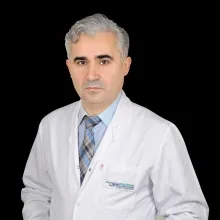 Prof. Dr. Veli Yazısız — Antalya. Portre fotoğrafı.