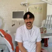 Dt. Uğur Yoldaş — Diş Hekimi. Portre fotoğrafı.