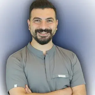 Dt. Oğuzhan Ünlü — Diş Hekimi, Denizli. Portre fotoğrafı.