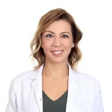 Uzm. Dr. Tuba Çelebi Kayhan — Dermatoloji, Denizli. Portre fotoğrafı.