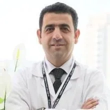 Op. Dr. İ.Burhan Özel — Kadın Hastalıkları Ve Doğum, Diyarbakır. Portre fotoğrafı.