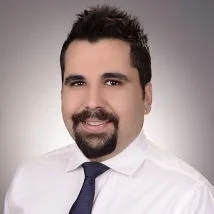 Dr. Öğr. Üyesi Halis Ali Çolpak — Ağız Diş Ve Çene Cerrahisi, Antalya. Portre fotoğrafı.