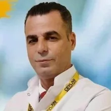 Doç. Dr. Derih Ay — Kalp Ve Damar Cerrahisi, Eskişehir. Portre fotoğrafı.