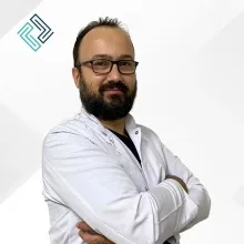 Uzm. Dr. Ayhan Atakan — Kardiyoloji, Avcılar, İstanbul. Portre fotoğrafı.