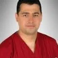 Prof. Dr. Mehmet Serkan Gür — Radyoloji, Konak, İzmir. Portre fotoğrafı.