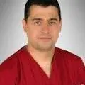 Prof. Dr. Mehmet Serkan Gür — Radyoloji, Konak, İzmir. Portre fotoğrafı.