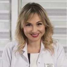 Uzm. Dr. Hüray Hügül — Dermatoloji, Antalya. Portre fotoğrafı.
