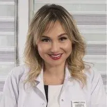 Uzm. Dr. Hüray Hügül — Dermatoloji, Antalya. Portre fotoğrafı.