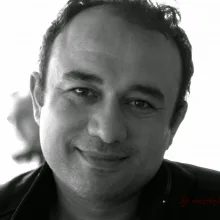 Op. Dr. Mehmet Hilmi Mercan — Çocuk Cerrahisi, İzmir. Portre fotoğrafı.