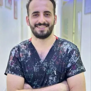 Dt. Barış Portakal — Diş Hekimi, İzmir. Portre fotoğrafı.