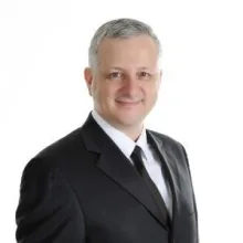 Dr. Korkut Doğaneli — İstanbul. Portre fotoğrafı.