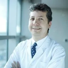 Prof. Dr. Kaan Oysul — Radyasyon Onkolojisi, Çankaya, Ankara. Portre fotoğrafı.