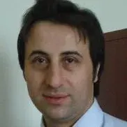 Prof. Dr. Cavit Boz — Nöroloji, Trabzon. Portre fotoğrafı.