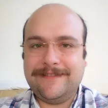 Dt. Aslan Murat İspir — Diş Hekimi, Adana. Portre fotoğrafı.