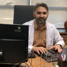 Uzm. Dr. Necmettin Tüfekci — Konya. Portre fotoğrafı.