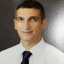 Doç. Dr. Erdinç Civelek — Beyin Ve Sinir Cerrahisi. Portre fotoğrafı.