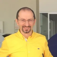 Prof. Dr. Güngör Karagüzel — Çocuk Cerrahisi, Konyaaltı, Antalya. Portre fotoğrafı.