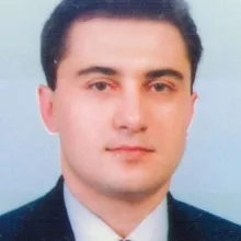 Prof. Dr. Vasfi Karatosun — Ortopedi Ve Travmatoloji, İzmir. Portre fotoğrafı.