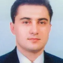 Prof. Dr. Vasfi Karatosun — Ortopedi Ve Travmatoloji, İzmir. Portre fotoğrafı.