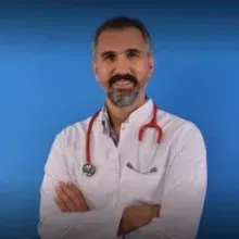Uzm. Dr. Nusret Parlaz — Çocuk Sağlığı Ve Hastalıkları, Antalya. Portre fotoğrafı.