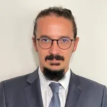 Doç. Dr. İ. Eralp Kaçmaz — Ortopedi Ve Travmatoloji, Çiğli, İzmir. Portre fotoğrafı.