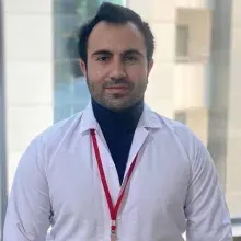 Dyt. Alper Büyükbayram — Diyetisyen. Portre fotoğrafı.