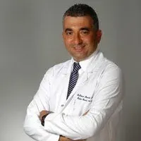 Prof. Dr. Ahmet Barış Güzel — Kadın Hastalıkları Ve Doğum, Adana. Portre fotoğrafı.