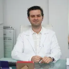 Op. Dr. Erhan Çağatay — Kadın Hastalıkları Ve Doğum, İzmir. Portre fotoğrafı.