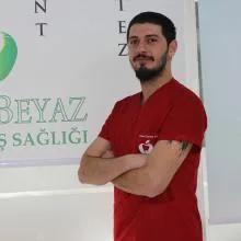 Dt. Kaan Evren Kır — Diş Hekimi, Bursa. Portre fotoğrafı.