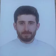 Dkt. Üzeyir Aydın — Dil ve Konuşma Terapisi. Portre fotoğrafı.