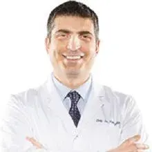 Doç. Dr. Yunus Aydın — Denizli. Portre fotoğrafı.
