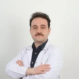 Uzm. Dr. Furkan Korkmaz — Psikiyatri, İstanbul. Portre fotoğrafı.
