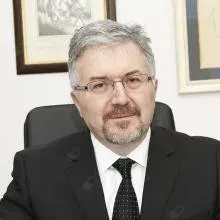 Prof. Dr. Ekmel Tezel — Genel Cerrahi, Ankara. Portre fotoğrafı.