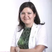 Uzm. Dr. Reyhan Tuncay — Fiziksel Tıp Ve Rehabilitasyon, Çankaya, Ankara. Portre fotoğrafı.