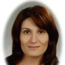 Uzm. Dr. Sevilay Özcan — Psikiyatri, Adana. Portre fotoğrafı.