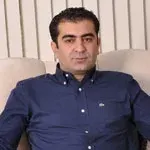 Uzm. Dr. Özgür Deniz — Çocuk ve Ergen Psikiyatrisi, Bursa. Portre fotoğrafı.