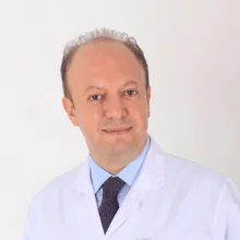 Doç. Dr. Hüseyin Okutan — Kalp Ve Damar Cerrahisi, Muratpaşa, Antalya. Portre fotoğrafı.