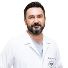Prof. Dr. Çağdaş Erdoğan — Nöroloji, Denizli. Portre fotoğrafı.