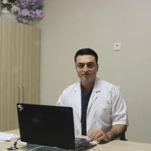 Op. Dr. Fatih Adanacıoğlu — Adana. Portre fotoğrafı.